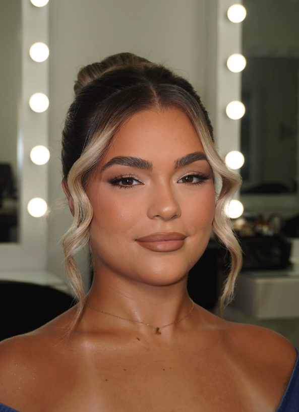 Soft glam makeup with dewy skin and long lashes